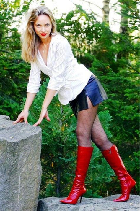 woman in red boots boots red boots high heel boots