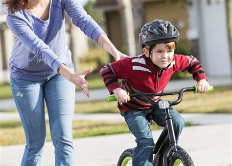 parents  paying professionals  teach  child  ride  bike