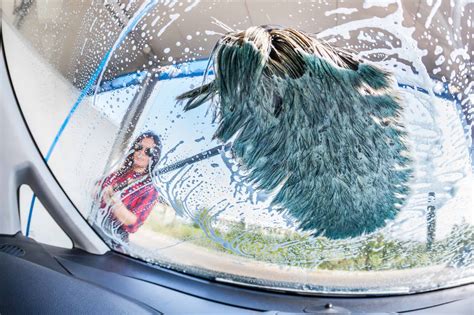 clean     car windshield  motor guy