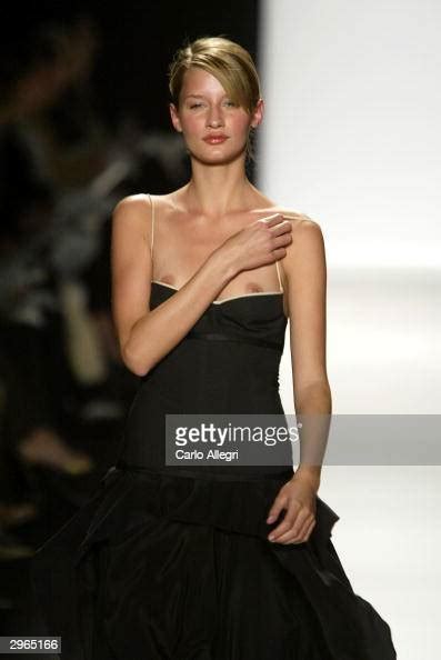 A Model Walks Down The Runway With Her Breast Exposed At The Narciso