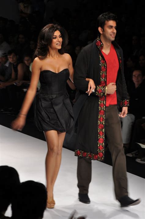 high quality bollywood celebrity pictures sushmita sen sizzling hot on ramp in a short black dress