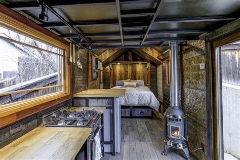 tiny house boasts luxury features  eclectic decor choices curbed