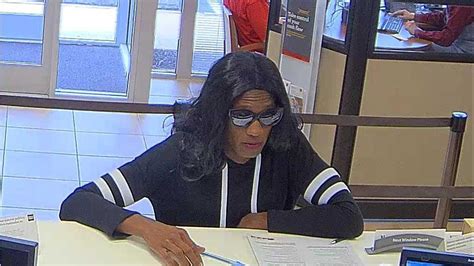 man dressed in wig women s clothing robs bank in chesapeake