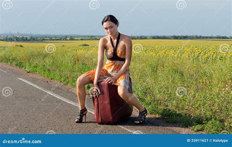 woman in stilettos hitching a ride stock image image of smile