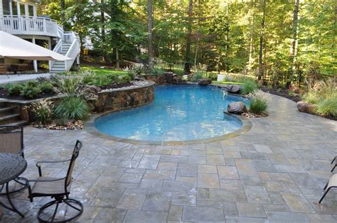 custom freeform pool  natural stone pool decking annapolis md