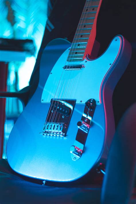 Download Neon Light Electric Guitar Wallpaper | Wallpapers.com