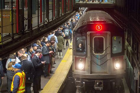york subway riders   risking death  escape delayed trains