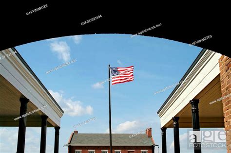 american flag  fort clinch    entrance stock photo