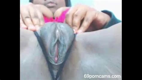 ebony girl rubs her fat pussy and squirts more at xvideos