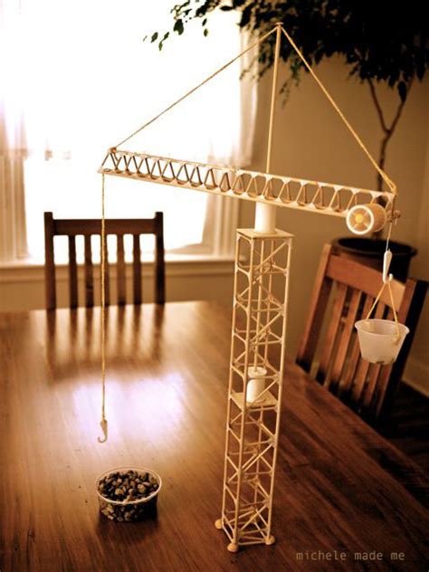 mom   year  build ingenious tower crane  sticks  thread