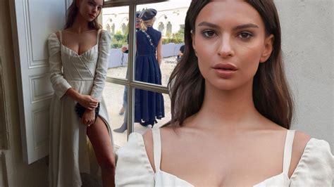 emily ratajkowski flashes her lithe legs and ample assets in a china