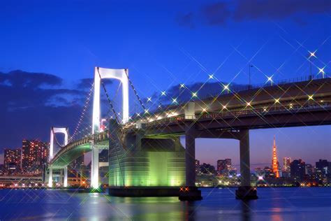 tokyo japan  capital metropolis bridge lights lighting lights glare bay houses