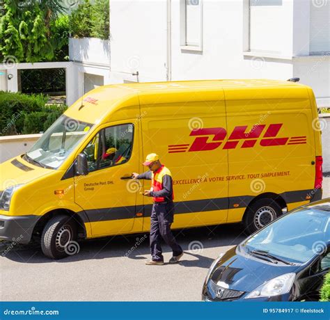 courier enters dhl yellow delivery van  delivering   time delivering package parcel