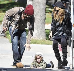 rachel zoe swings her son for the paps and he falls over