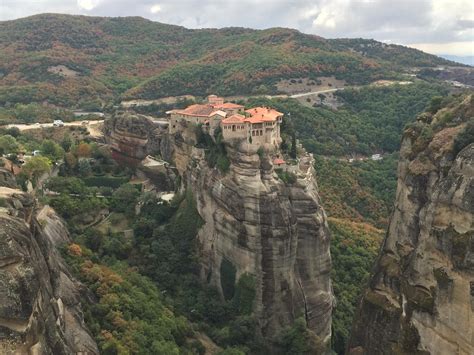 meteora greece   century cathedrals built  top  cliffs travel
