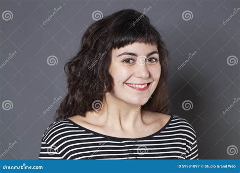 Portrait Of Cute 20s Brunette Girl With Natural Smile Stock Image