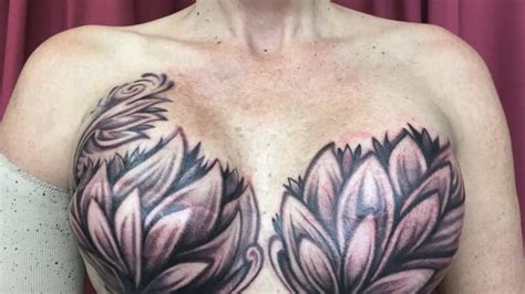 breast cancer survivor covers mastectomy scars with breast tattoo