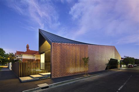 perforated building facades  redefine traditional design