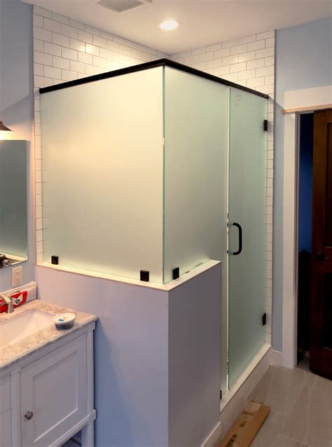 frosted heavy glass shower enclosure adds some privacy