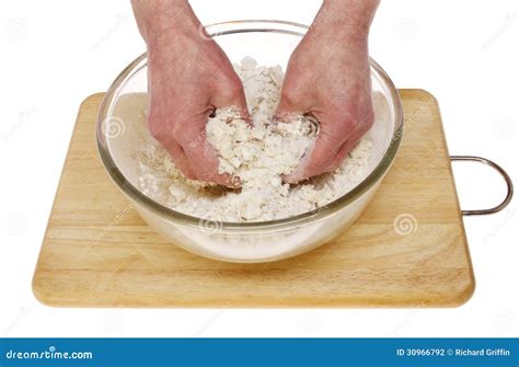 hands mixing dough stock photography image
