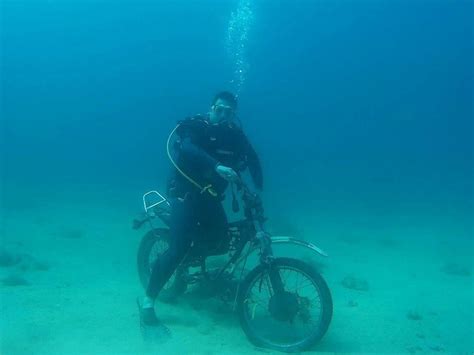 someone dropped their bike into the sea makes for some