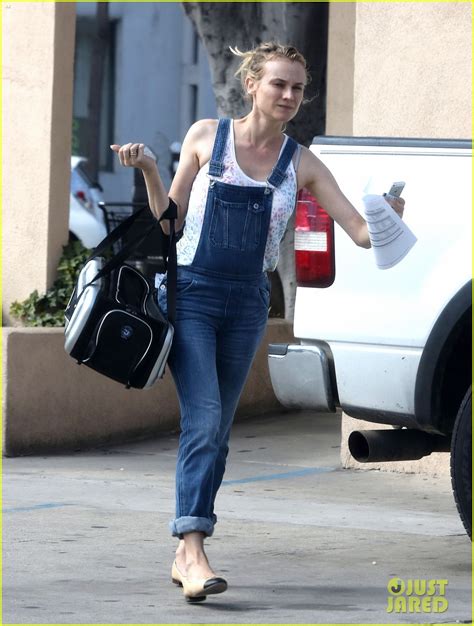 diane kruger wears her overalls to bring her cat to the