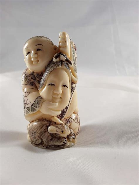 vintage netsuke resin scrimshaw  inches tall   wide etsy netsuke scrimshaw hand