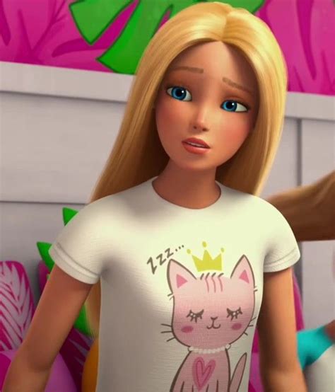 The Barbie Doll Is Wearing A T Shirt With A Cat On It