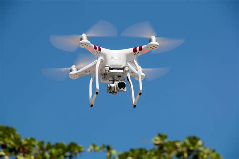 drone flying  blue sky  stock photo