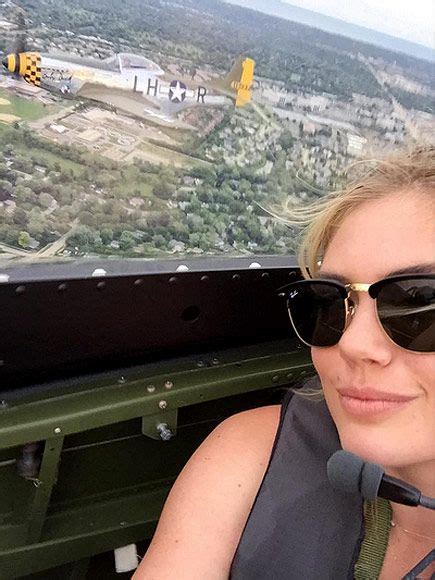 kate upton takes selfie while flying in wwii plane