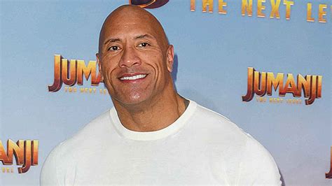 dwayne ‘the rock johnson flaunts biceps after talking ‘perfect abs