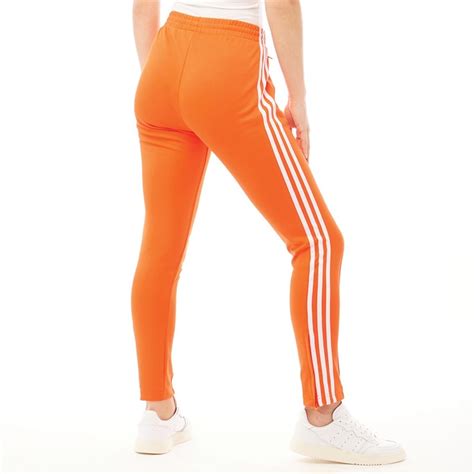 adidas originals dames superstar trainingsbroek oranje