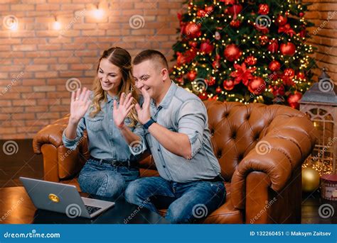 Young Couple Chatting With Relatives Via Webcam Stock Image Image Of