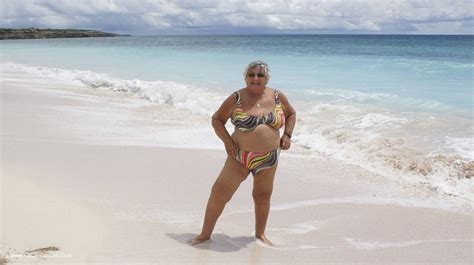 Hot Granny In Rainbow Colored Bikini Pose Her Fat Body On