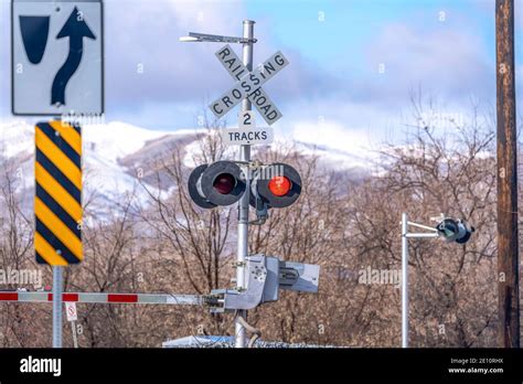 grade crossing signal  red light gate  crossbuck  railroad