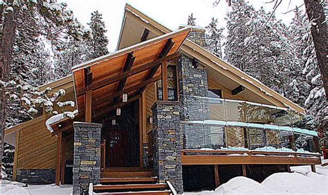 modern mountain alpine home design  includes  steep sloped roof  combination  rock