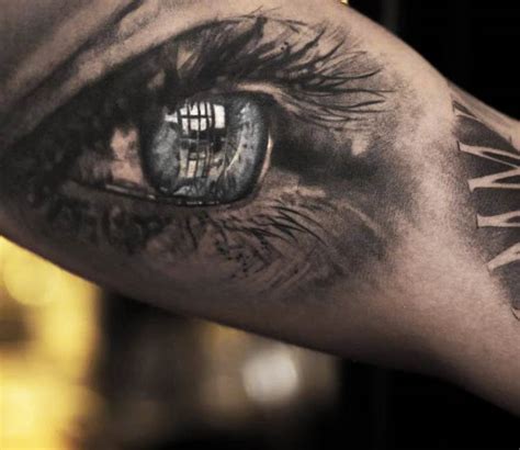 blue eye tattoo by niki norberg post 14464