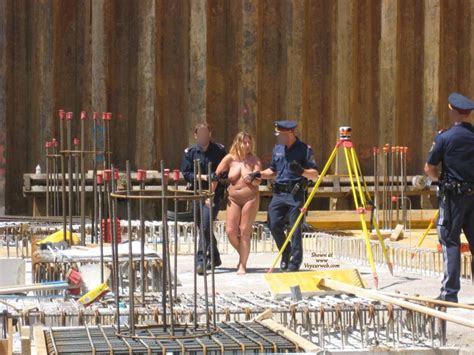nude girl escorted by officers july 2009 voyeur web