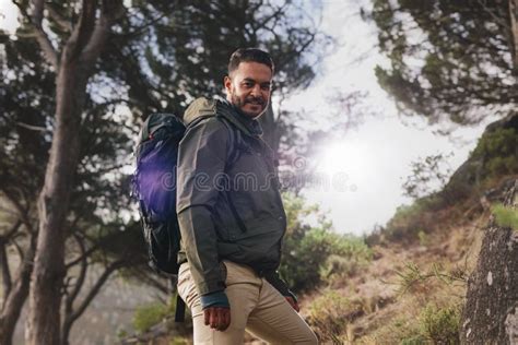 handsome young man hiking  nature stock image image  young