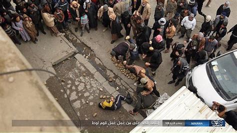 isis release images from public execution in mosul daily