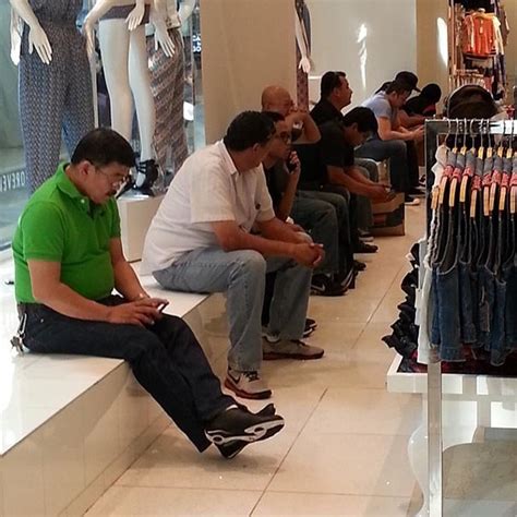 mall misery photos of men caught in shopping hell elite