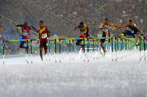 8 Stunning Photos From The Rain Soaked Track And Field Events At The