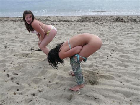 naughty girls pissing on the beach mature porn photo