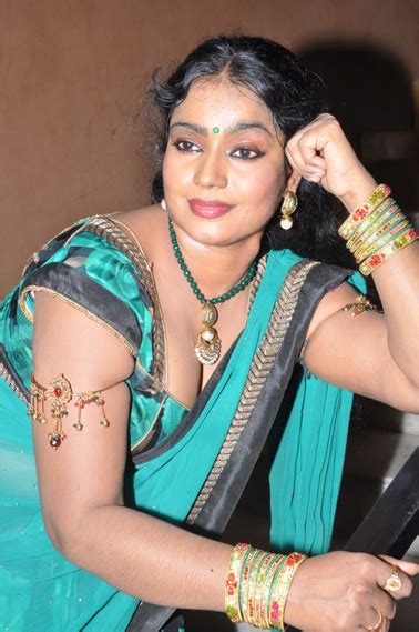 kerala busty aunty jayavani hot b bs showing in sexy low neck blouse spicy saree exposing