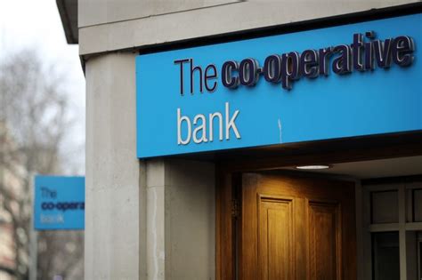 op bank narrows losses  warns  mortgage competition cityam