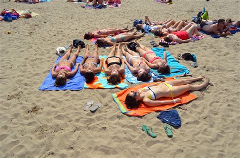 girls tanning  beach abbey road programs flickr