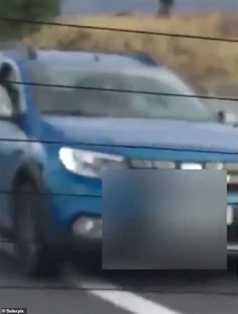 couple filmed having sex while driving along spanish motorway are