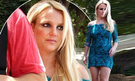Britney Spears Shows Off Her Legs In A Tight Lacy Mini