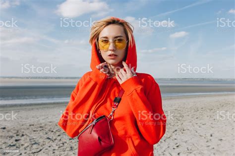 Beautiful Girl In Red Hoodie Standing On Beach Saint Michaels Mount