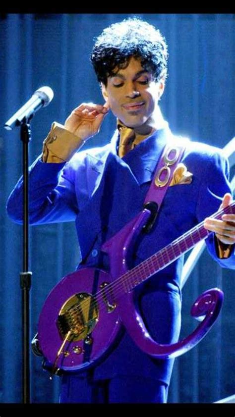 prince the symbol with him purple guitar prince purple rain prince